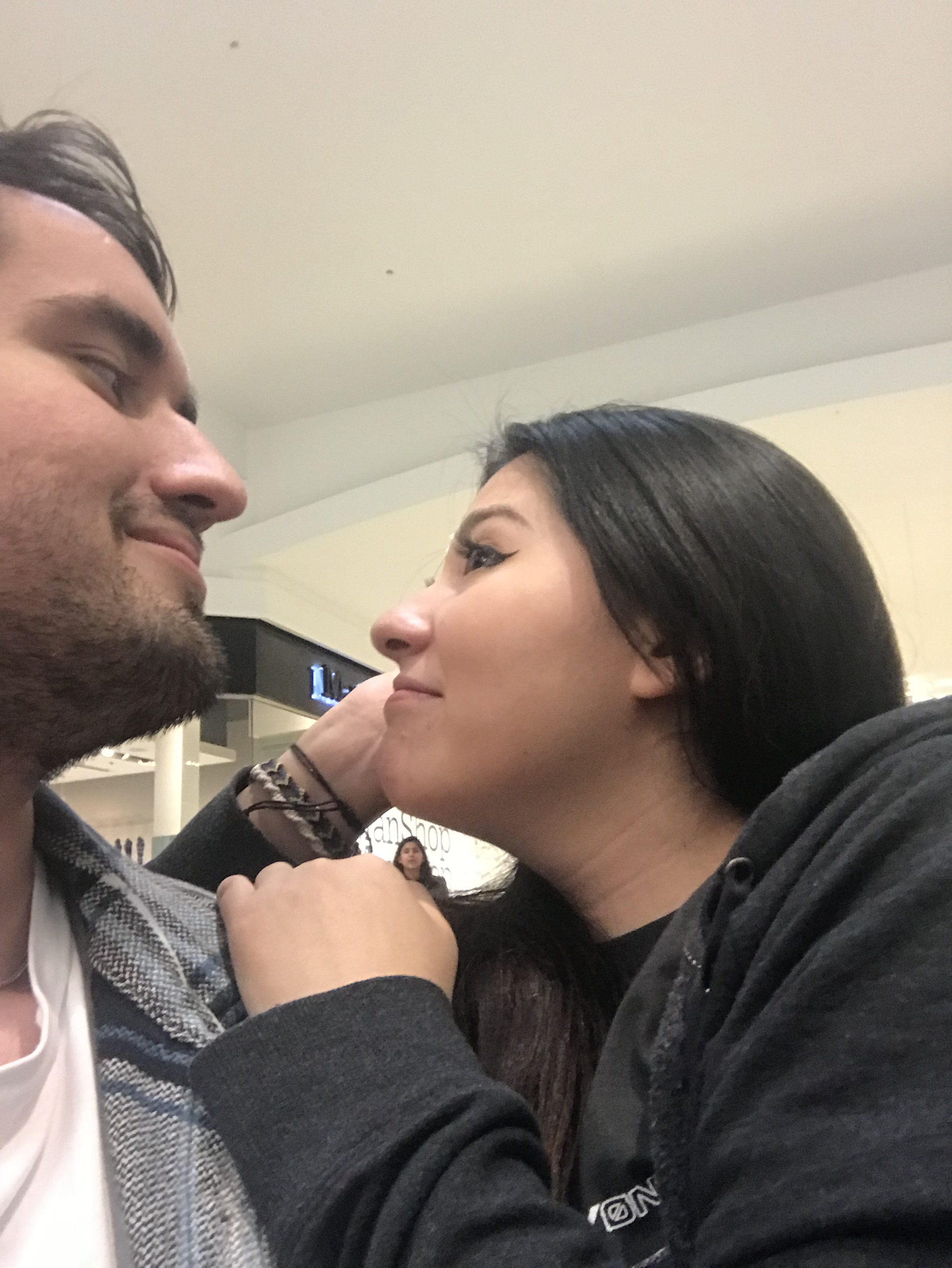 Picture of my fiance and I looking at each other